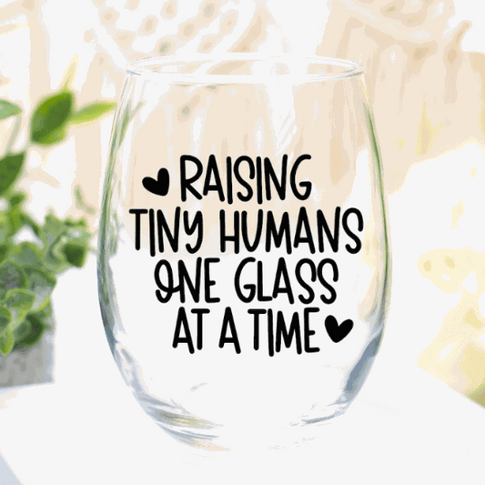 Funny customized stemless wine glass with "Raising Tiny Humans" quote, 17 oz, gift for parents.