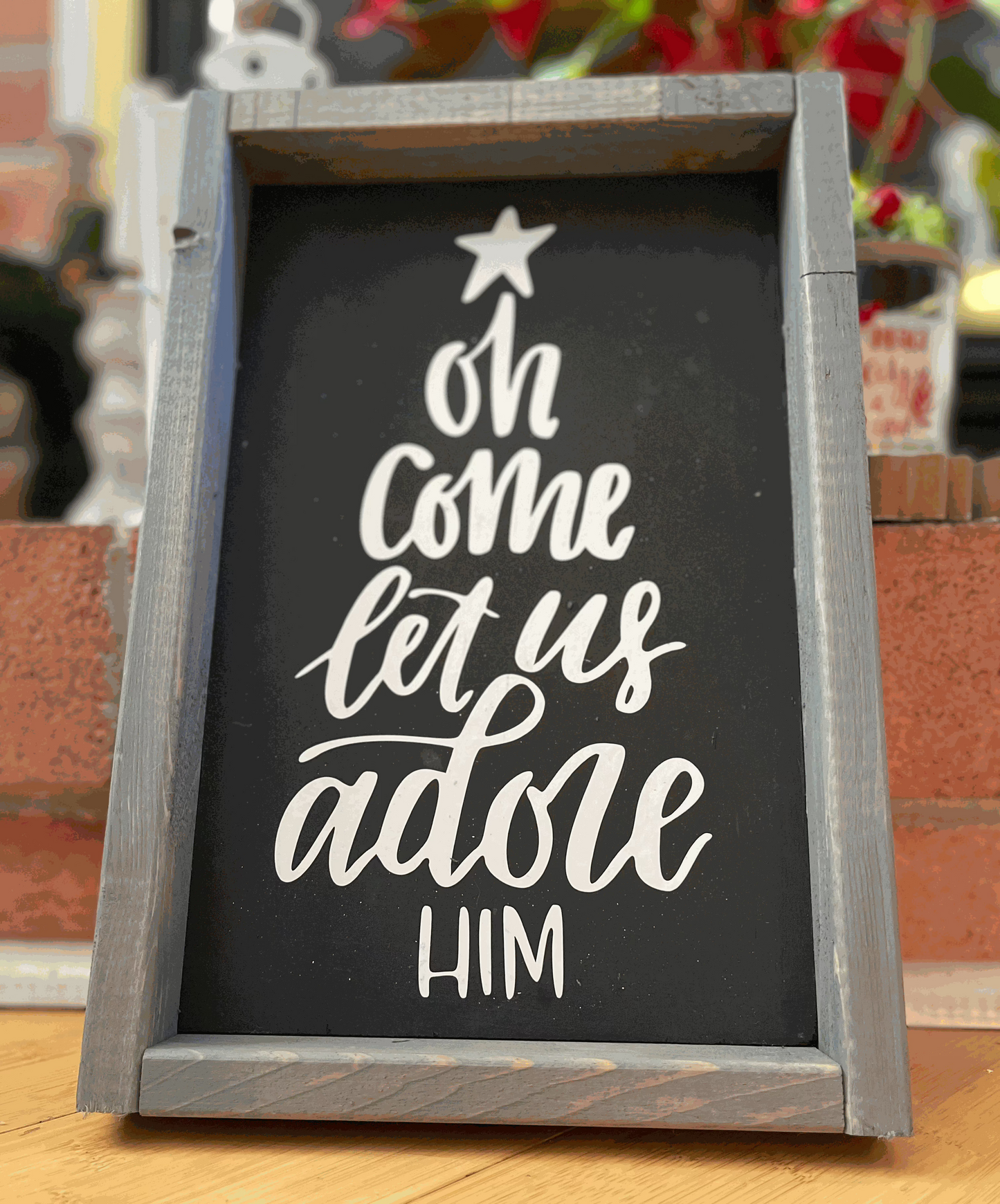 Handmade "Oh Come Let Us Adore Him" framed Christmas wood sign with black background and white lettering, 12x8 inches.