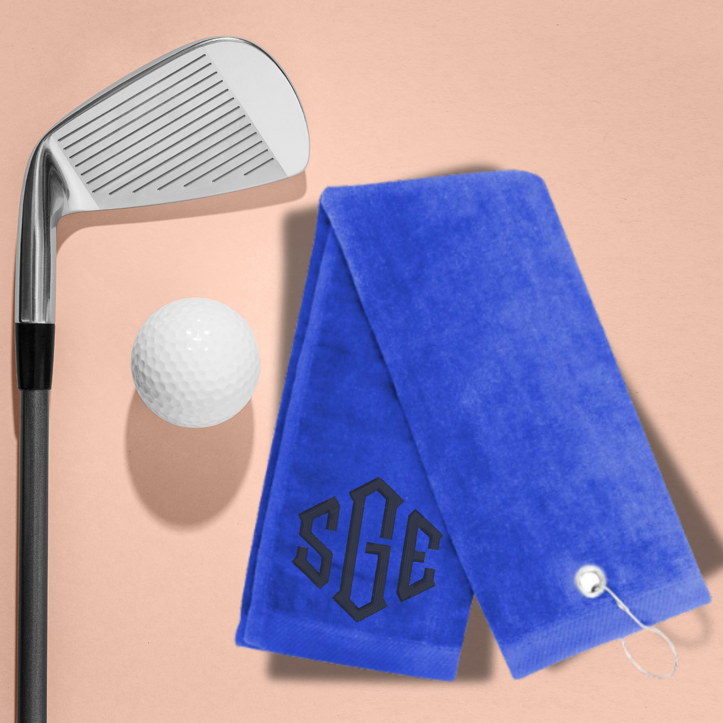 Blue personalized golf towel with custom monogram and hook, perfect for golf enthusiasts.