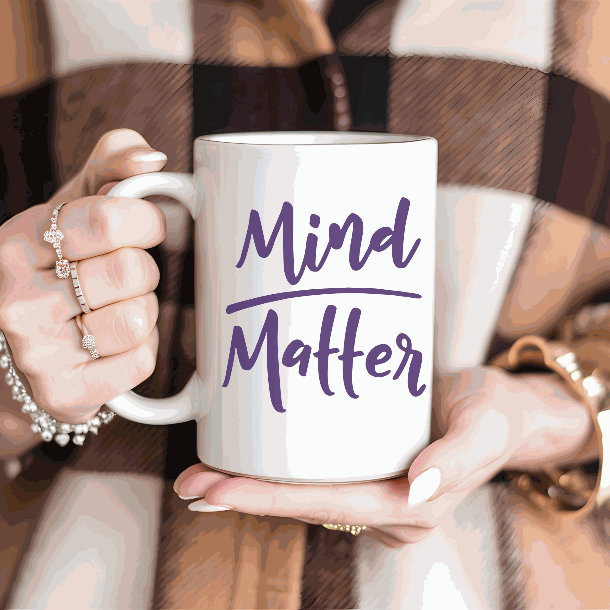 Inspirational ceramic mug with "Mind over Matter" text in purple.