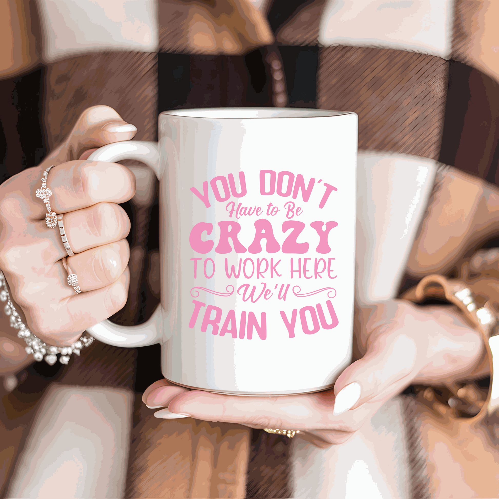 Ceramic mug with "You Don't have to be Crazy to work here, We will train you" design, white and glossy, 15 oz.