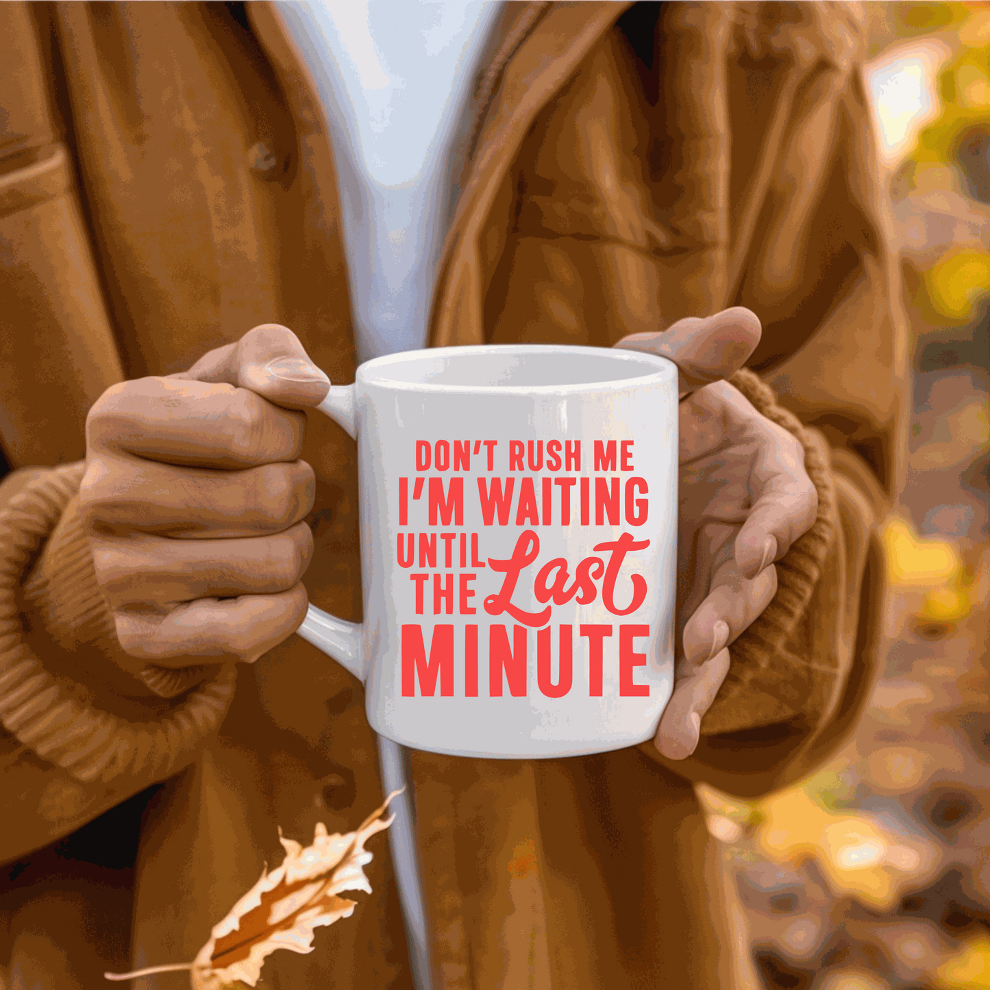 Ceramic coffee mug with "Don't Rush Me I'm Waiting Until the Last Minute" text design.