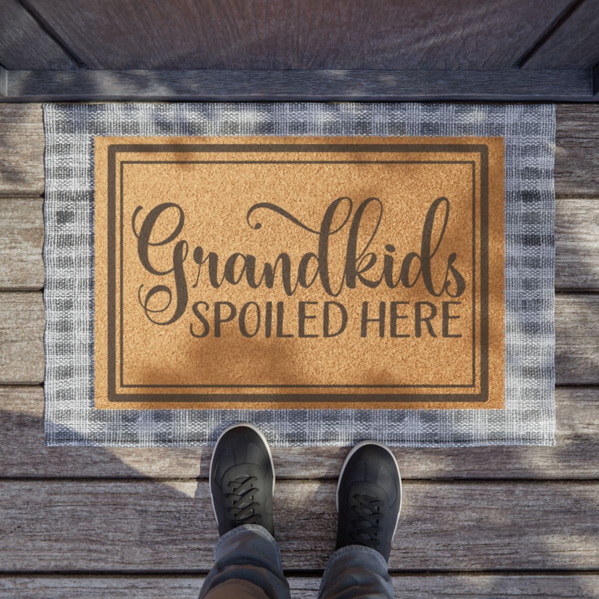 Personalized doormat with "Grandkids Spoiled Here" text, 24x16 inches, tufted coir fiber, black vinyl backing, outdoor use.