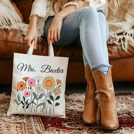 Personalized wildflower tote bag with teacher's name, made from eco-friendly cotton canvas, featuring a charming floral design.