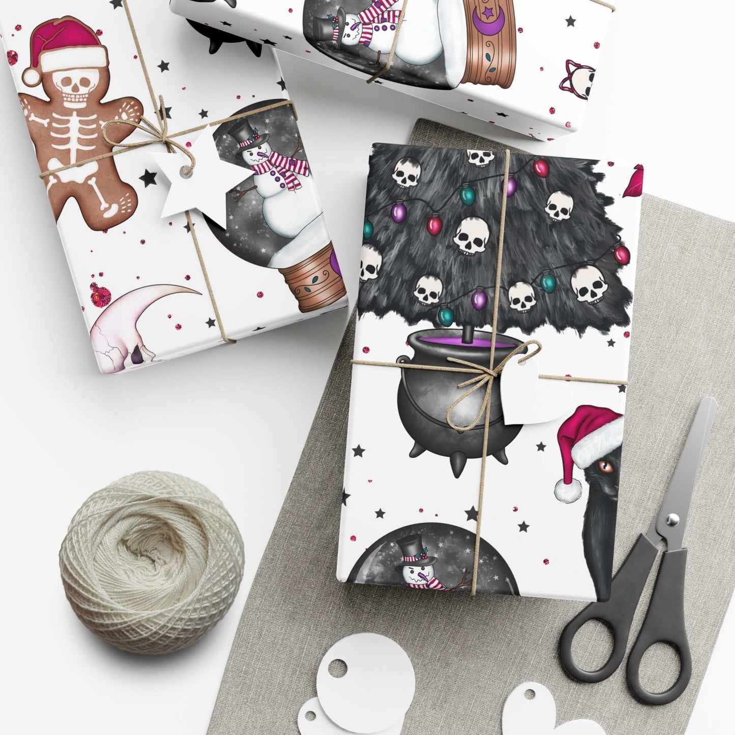 Gothic style Christmas wrapping paper with black cat and spooky holiday designs.