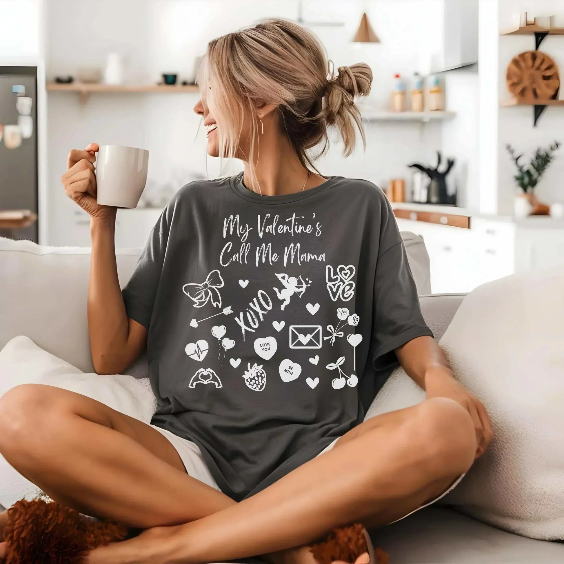 Cute Valentine's Day mom t-shirt with "My Valentine's Call Me Mama" design, cozy fit, perfect for moms, available in multiple