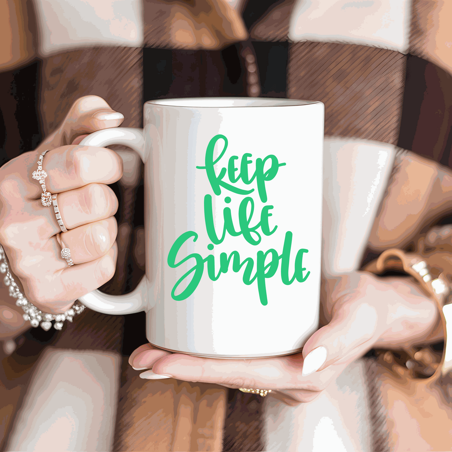 Inspirational white ceramic coffee mug with "Keep Life Simple" design in green lettering.