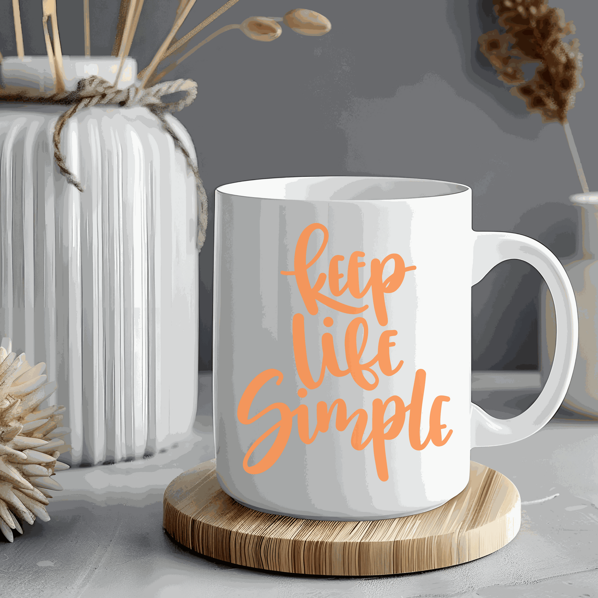 Inspirational coffee mug with "Keep Life Simple" design.