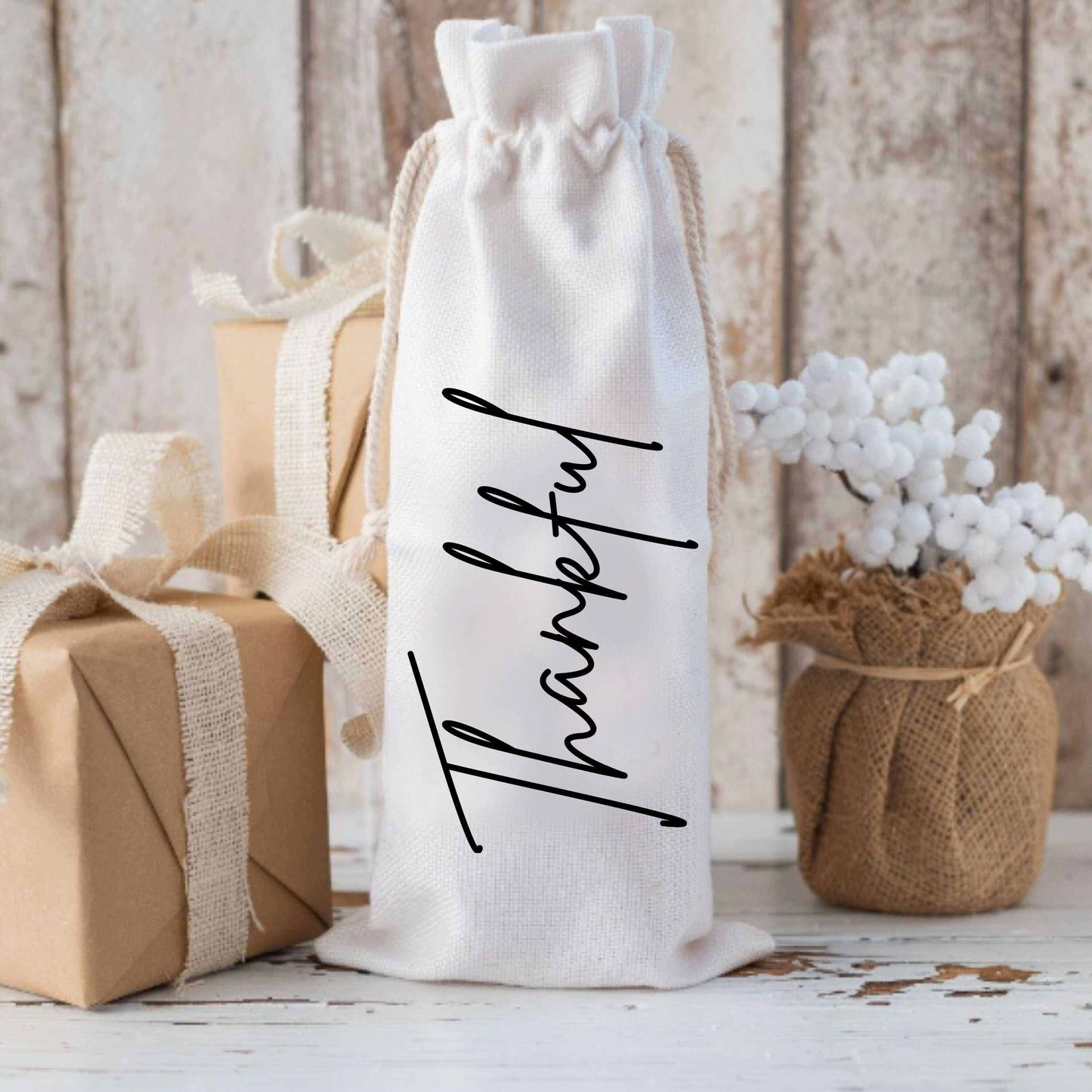 Custom holiday wine bag, personalized canvas gift bag with "Thankful" text.