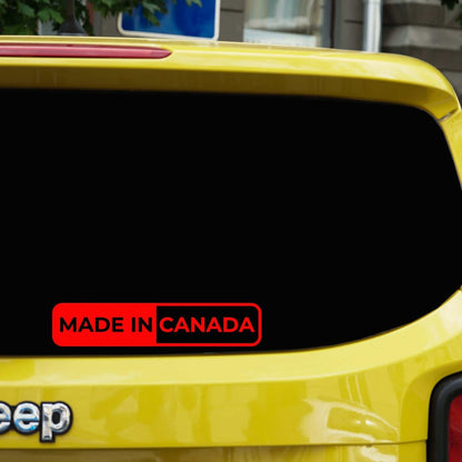 Made in Canada car window sticker with red and bold high-contrast lettering on a yellow vehicle.