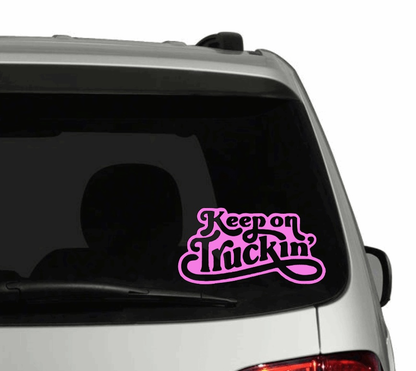 Keep On Truckin Sticker on car window.