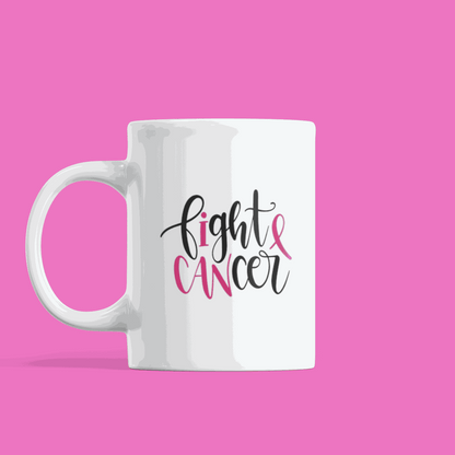 'I Can Fight Cancer' sticker on white mug with pink background.
