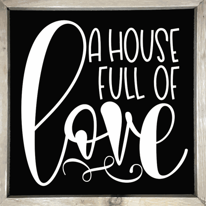 Handmade wood sign with "A House Full of Love" quote in white letters, black background, rustic frame.