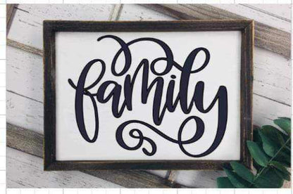 Handcrafted personalized family wood sign with black lettering on a white background, featuring a rustic wooden frame.