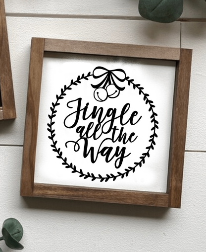 Handcrafted "Jingle All the Way" wooden sign with brown frame and black lettering, festive home decor.