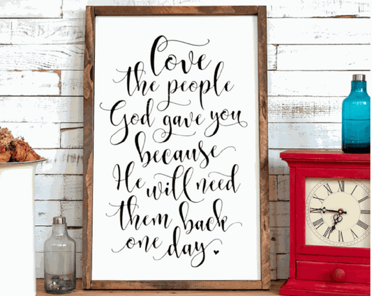 Handcrafted framed wood sign with inspirational quote "Love the People God Gave You"; ideal for home decor.