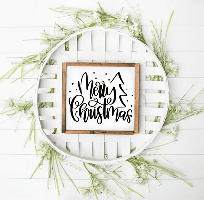 Handmade Merry Christmas wood framed sign with antique white background, black lettering, and pine wood frame.