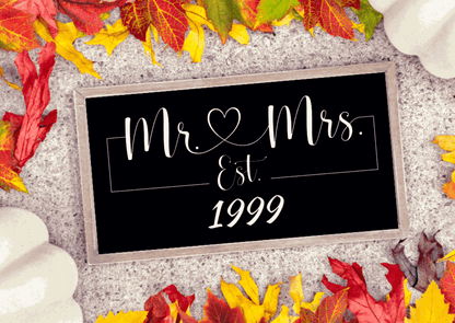 Handmade wooden Mr. and Mrs. wedding sign with rustic flair, customizable, featuring "Est. 1999" on a black background with white lettering.