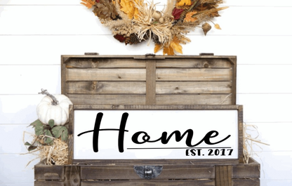 Rustic farmhouse wood sign with personalized "Home" design and customizable est. date, crafted from pine with stained frame.