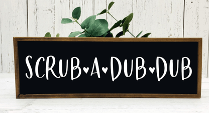 Handmade wood bathroom sign with "Scrub A Dub Dub" text on black background.