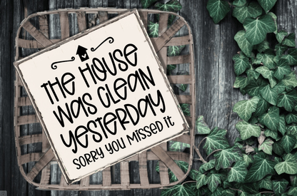 Handmade rustic wood sign with "The House was Clean Yesterday" quote, white background, black lettering.