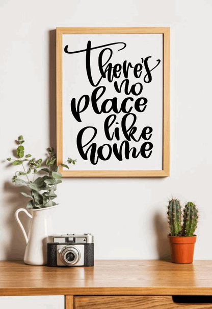 Framed wood sign with "There’s no place like home" text, customizable.