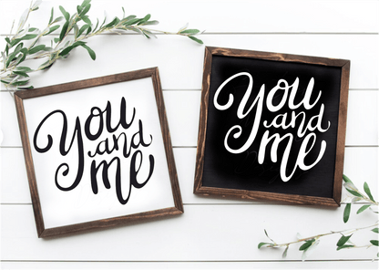 Handmade "You and Me" inspirational wood signs in black and white frames with unique natural variations.